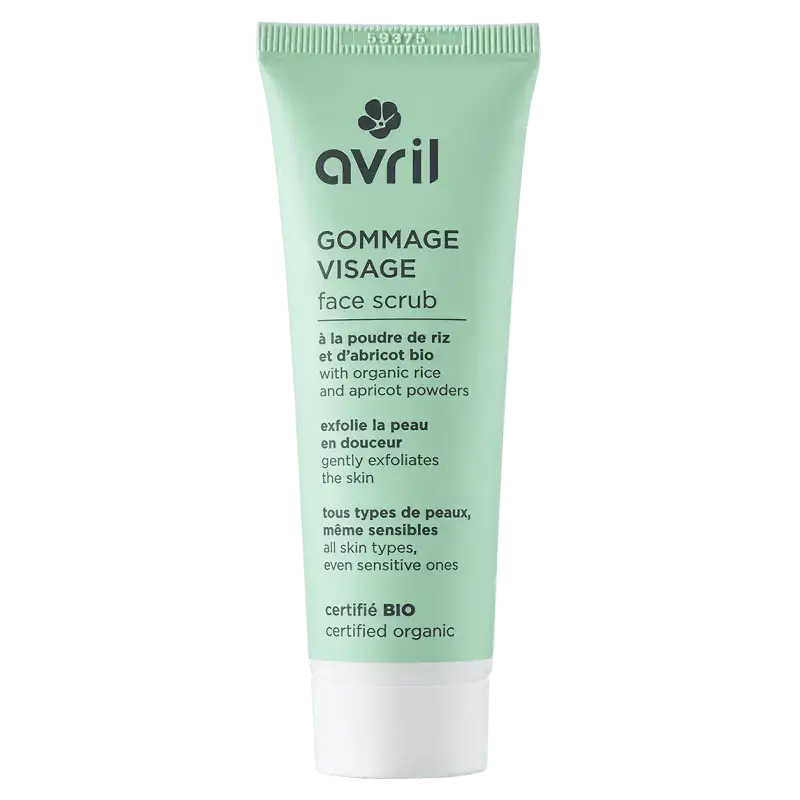 Un tube vert menthe de gommage visage avril avec poudre de riz biologique et noix dabricot